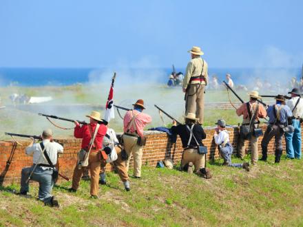 group of men reenacting a war