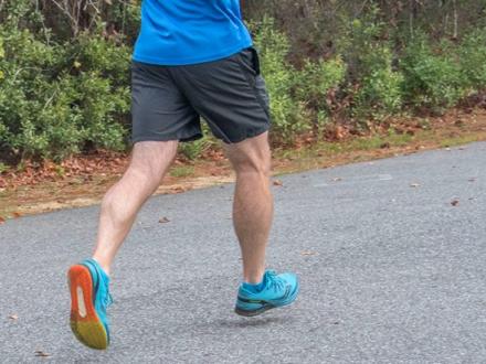 Man running in Mullet Man Triathlon in Orange Beach AL