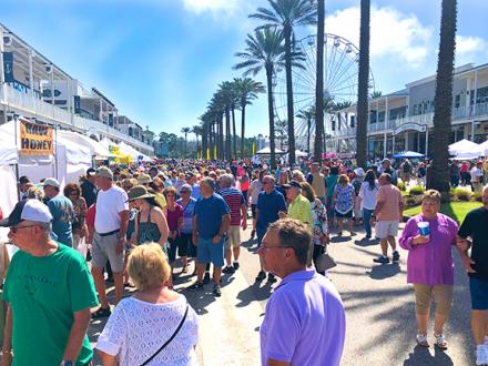 Visitors enjoy Orange Beach Seafood Festival and Car Show at The Wharf in Orange Beach AL