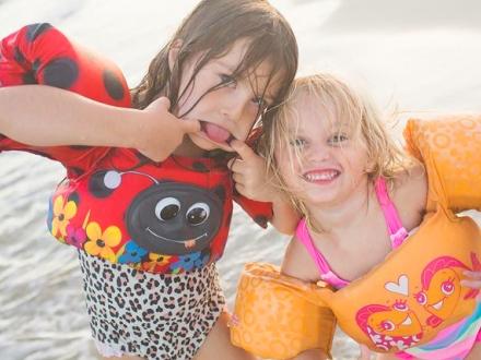 Young kids enjoy Fall Beach Vacation