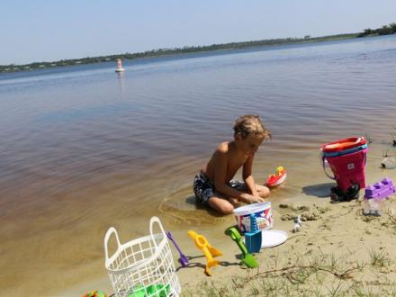 Boy playing at Lake Shelby in Gulf Shores