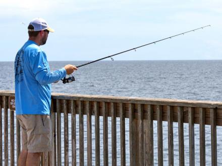 Man Fishing from Gulf State Park pier
