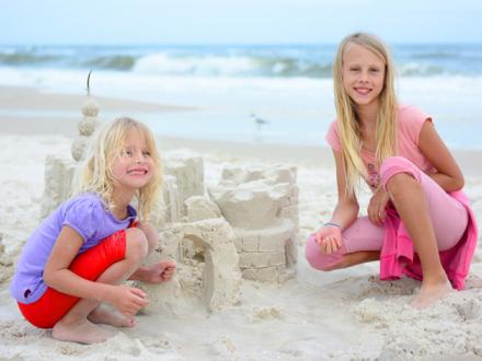 Girls with Sand Castle in Gulf Shores