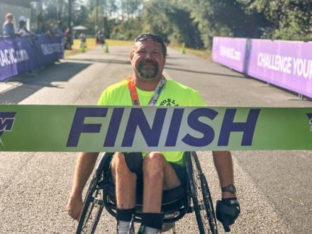 Run the Beach Series Orange Beach AL competitor in a wheelchair