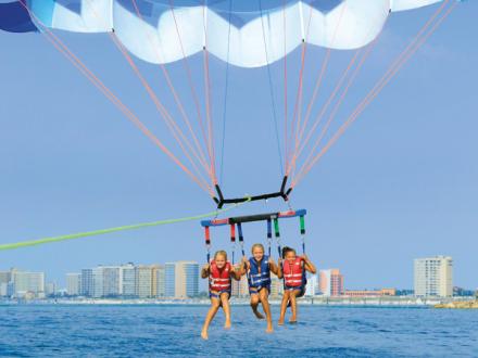 parasailing gulf shore - content image