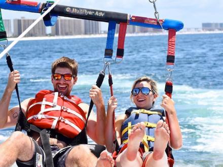 Couple parasailing in Gulf Shores