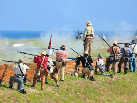 group of men reenacting a war