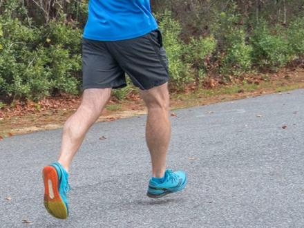Man running in Mullet Man Triathlon in Orange Beach AL