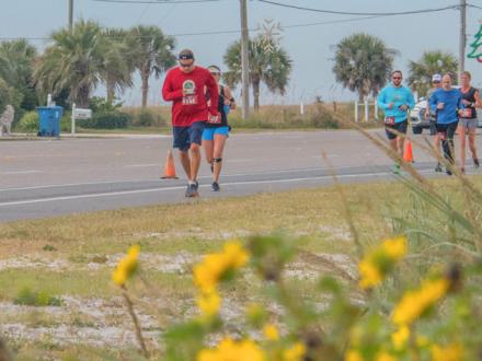 Runners participate in Big Beach Marathon in Orange Beach