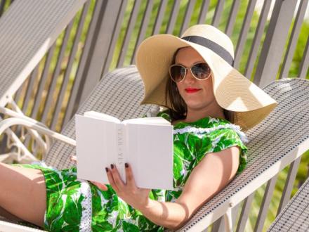 lady relaxing and reading in Gulf Shores AL