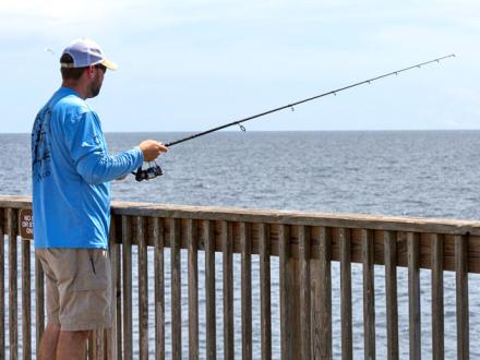 Man Fishing from Gulf State Park pier