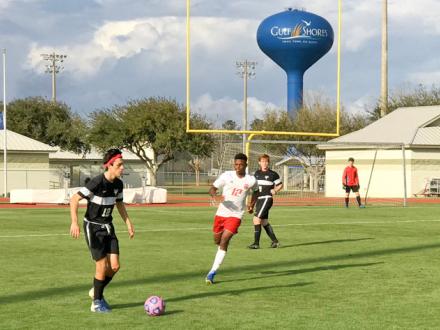 Boys play soccer in Gulf Shores