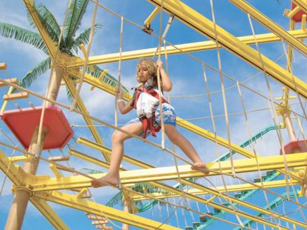 Girl on ropes course at LuLu's Gulf Shores