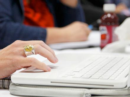 Woman on Laptop during meeting