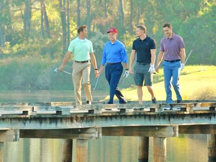 Golfers play at Kiva Dunes Golf Course