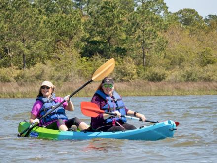 Women kayaking with Wild Native Tours