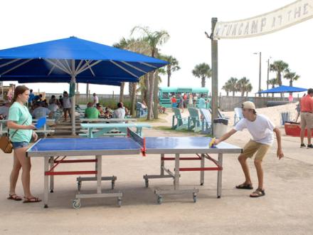 Teens play ping pong at The Hangout in Gulf Shores