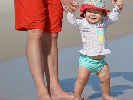 Baby walking on Alabama's Beaches