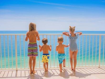 Children on condo balcony in Gulf Shores AL