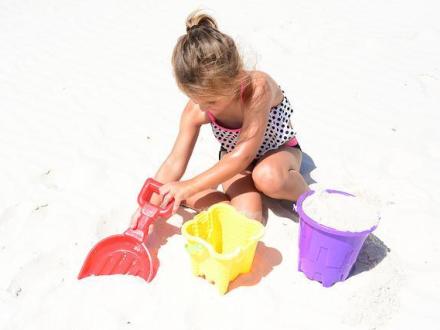 child playing in the sand, gulf shores, orange beach
