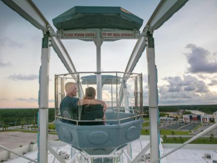 Couple on The Wharf Ferris Wheel in Orange Beach, AL