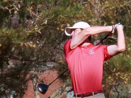 Man golfing on Alabama's beaches