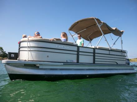 Family boating in Orange Beach, AL