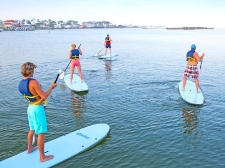 Family paddleboard in Orange Beach