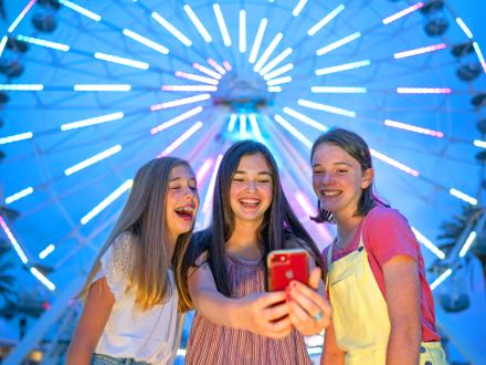 Teens at Wharf Ferris Wheel in Orange Beach