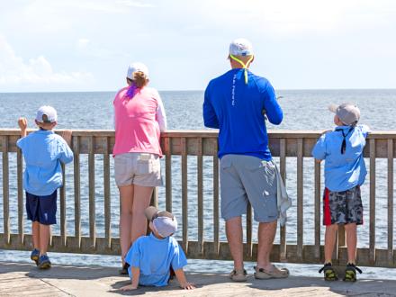 Family fishing on Gulf State Park pier