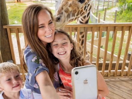 Family taking a selfie at the Alabama Gulf Coast Zoo in Gulf Shores
