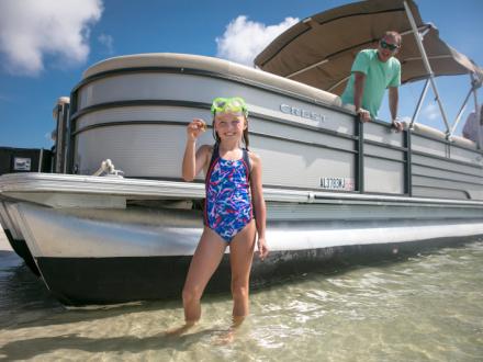 Young girl on a pontoon boat