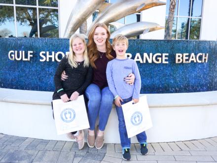 Family at the Gulf Shores Welcome Center