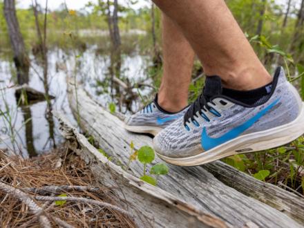 Man walking on the Pine Beach Trail in Gulf Shores