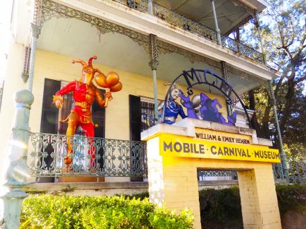 Brightly adorned mannequins show off the costumes and colors of Carnival at the Mobile Carnival Musseum in Mobile, Alabama.