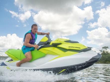 Man Jet Skiing through the backbay waters of Orange Beach