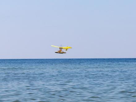 Magni Gyroflight flying over the Gulf of Mexico in Gulf Shores