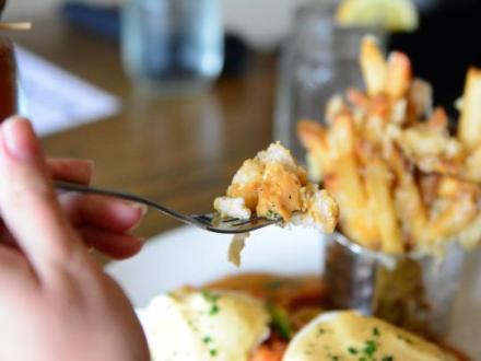 Bayou Benedict meal at Brick and Spoon brunch restaurant in Orange Beach
