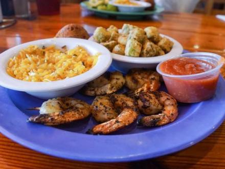 a plate shrimp skewers from Gulf Island Grill