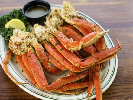 a plate of huge crab legs at Original Oyster House restaurant in Gulf Shores