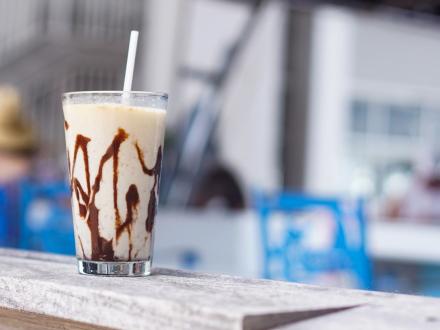 Bushwacker drink at Yoho Rum & Tacos in Orange Beach, drizzled with chocolate syrup for a sweet and tropical treat