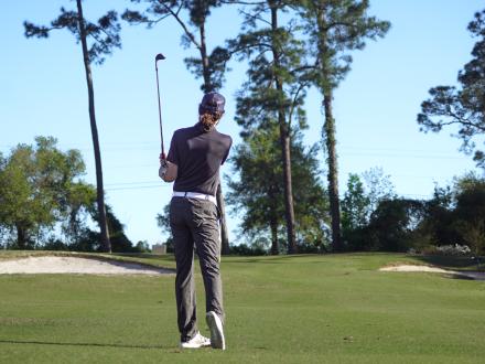 Man golfing at One Club Golf Course in Gulf Shores