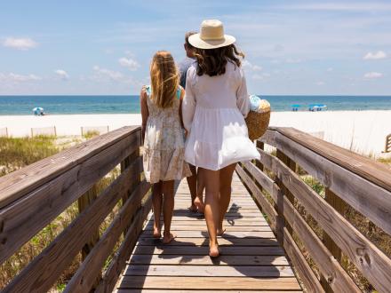a family enjoying their private beach access