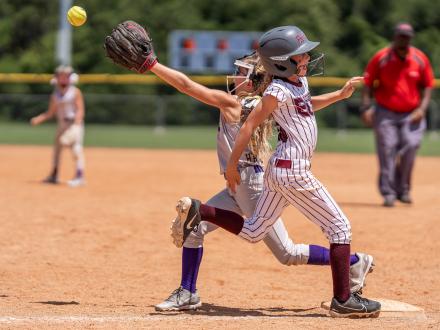 Softball players on Alabama's Beaches
