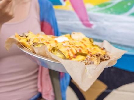 a plate of barbecue nachos at Hog Wild barbecue restaurant in Gulf Shores