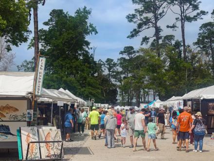 Crowd of people attending the Annual Orange Beach Festival of Art.