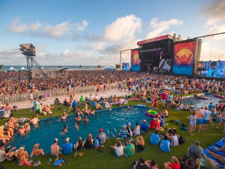 Crowd surrounding the stage at Sand in My Boots Music Festival