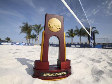NCAA Beach Volleyball Championship trophy in the sand at Gulf Shores