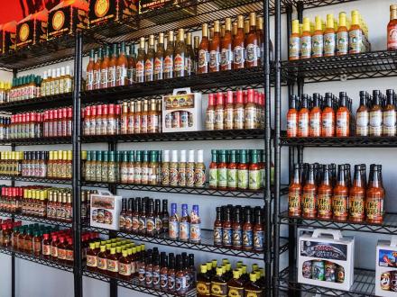 Shelves of hot sauce at the Pepper Palace at The Wharf in Orange Beach