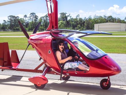 Woman riding in a gyroplane in Gulf Shores